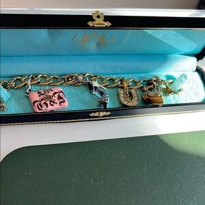 Juicy Couture Gold Charm Bracelet with laptop, shoe, and horseshoe charms